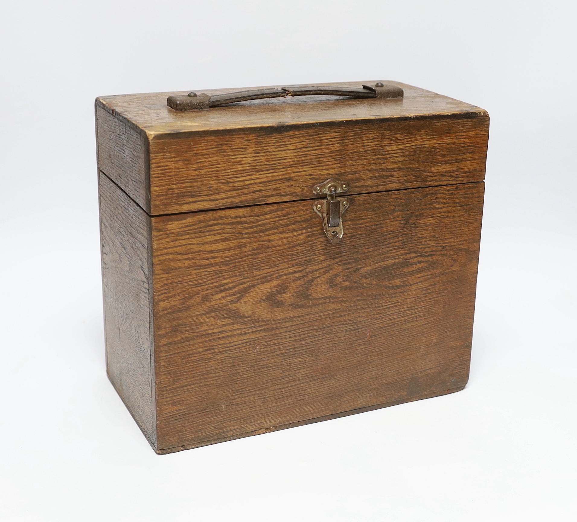 A vintage travelling vets box with two glass bottles and a stoneware bottle, Alfred Parker label to the interior, 24cm high